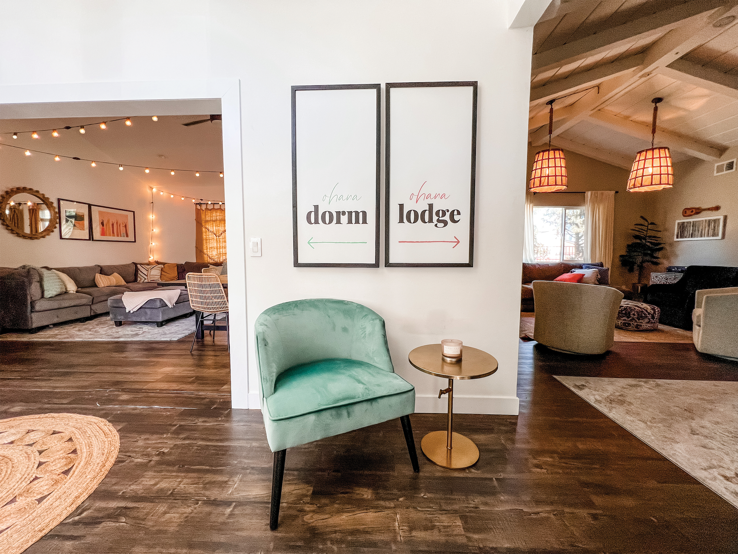 Ohana dorm: signs on the wall (ohana dorm with arrow pointing left & ohana lodge with arrow pointing right). You can see the dorm on th eleft side and the lounge on the right side