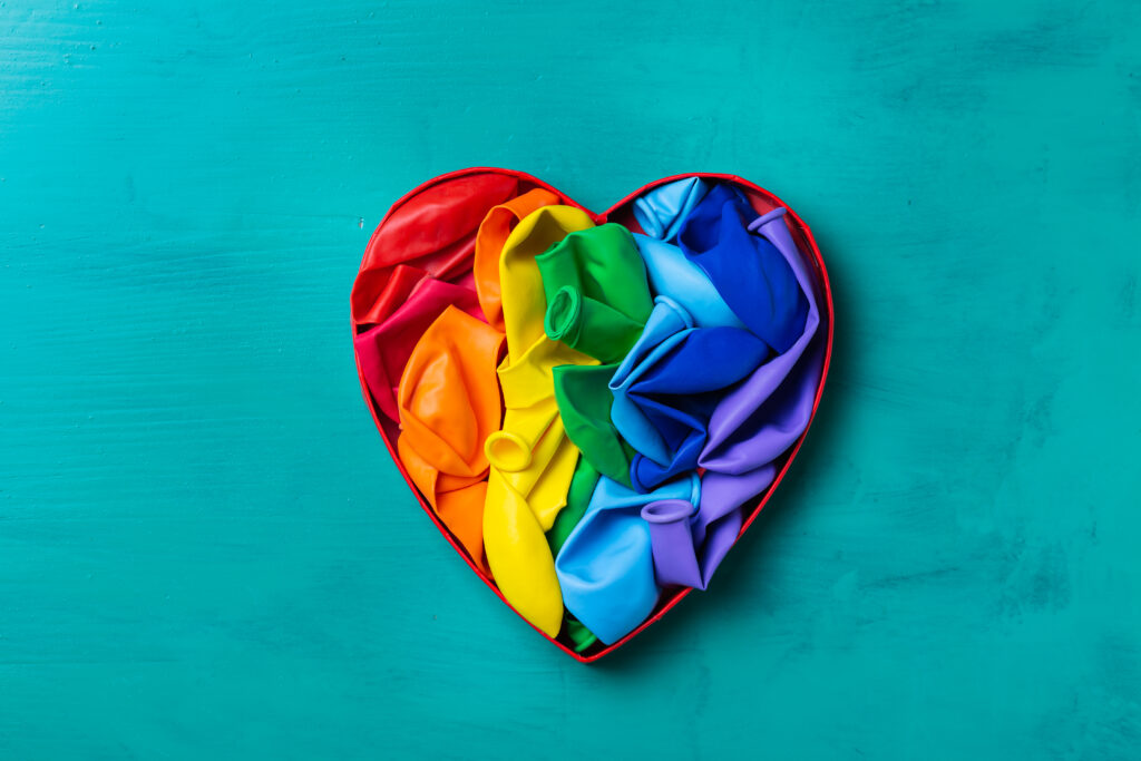 heart shaped rainbow lgbtq flag against turquoise 2023 11 27 04 53 43 utc Monima Wellness Center - Women's Treatment Center for Mental Health